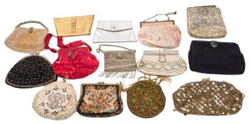 A collection of fourteen late 19th/20th Century purses: including examples in beadwork,