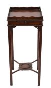 A Georgian mahogany square urn table:, with undulating galleried top and fitted with a candle slide,