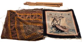 An early 20th Century machine made rug:, with galleon decoration, together with a small Tabriz rug,