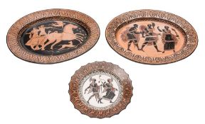 An early 19th century Guistiniani [Naples] creamware plate and two similar oval dishes: decorated