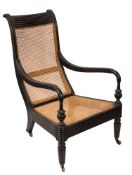 The Gladstone Chair - An early 19th Century Indo Colonial open armchair:,