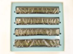 Fulgurex a boxed set of four French PO Coaches:, green with yellow coachlines.