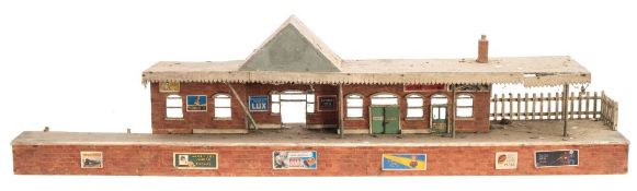 A scratch built wooden station and covered platform:,