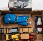 A group. of various scale model cars including a 1/18th scale model of Bugatti Type 57 Atlantic.