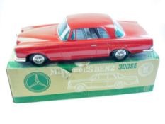 Ichiko (Japan) a large scale friction drive tinplate Mercedes Benz 300SE:,