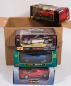 A collection of eight various 1/18th scale model cars by Corgi, Burrago and others:,