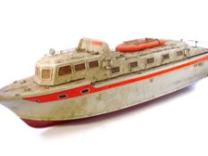 A radio control scale model of a Police launch together with one other hull:,
