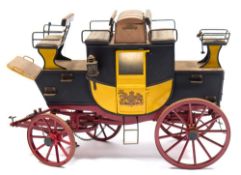 A tinplate scale model of a 19th century Royal Mail style coach:,