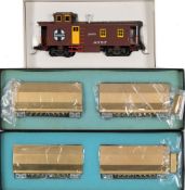 Trains Inc (Japan) Santa Fe side door caboose:, together with four SR hopper cars, unsigned,