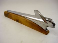 A Pontiac Chief chrome plated car mascot circa 1952:, on later wooden base 47cm long.