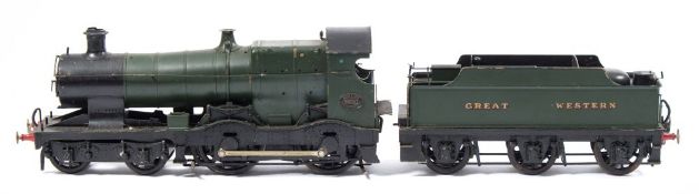 An electric 3 rail GWR 4-4-0 locomotive and tender 'Avalon' No 3320:, in black and green,