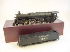 A KTM (Japan) Santa Fe 4-8-4 locomotive and sixteen wheel tender:,