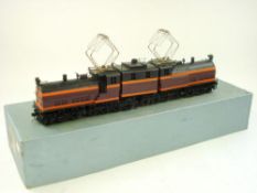 A KMT (Japan) painted 'Custom Brass Milwaukee Road Bi Polar':, in original box, 48cm long.