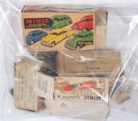 Three Tri-ang Minic product pamphlets together with a collection of various Tri-ang Minic boxes:,