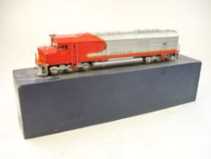 A KTM (Japan) EMD FP45 B-B diesel electric locomotive in Santa Fe silver red and orange:,