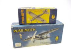 A Frog De Havilland 80A 'Puss Moth' 3 seat cabin monoplane:, in green and yellow, call sign G-AAXY,