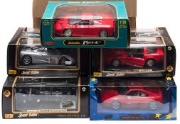Maisto and others a boxed group of 1/18th scale model cars:, including a McLaren F1.