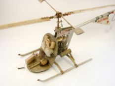 A radio control scale model of a Motor Torpedo Boat and a Schluter 'Heli-Baby' helicopter with