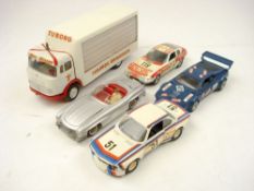 Tekno (Denmark) an unboxed Mercedes 300SL:, in silver with red interior and driver figure,