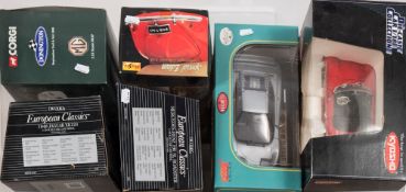 Ertl, Corgi and others a group of nine 1/18th scale model cars:,