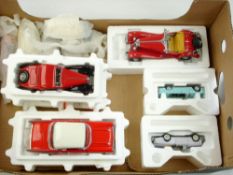 Franklin Mint a group of various scale model cars:, including a 1957 Chevrolet,
