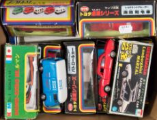 A collection of various Japanese diecast vehicles:, including Police and Fire service Toyota 4WD,