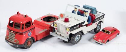 Daiya (Japan) a battery operated Police Patrol Jeep:, with flashing light , siren and stop sign,