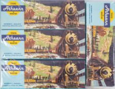 A collection of eight Athern (USA) locomotives and dummy cars:,
