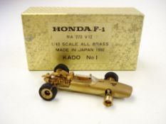 Kado (Japan),a 1/43 scale all brass Honda F-1 RA 273 V-12 racing car:, in original box,