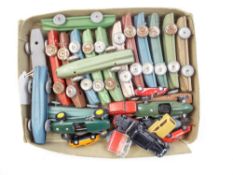 A collection of tinplate sports cars and other vehicles:.