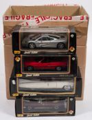 Burago and Maisto a group of 1/18th scale model cars:,