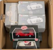 Corgi a group of five 1/18th scale model MGB Roadsters in red and white,