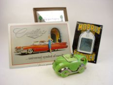 A Sadler Art Deco racing car teapot: in green with silver lustre trim,