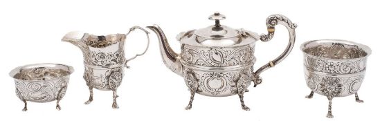 A matched Irish silver four-piece tea service, maker Charles Lambe,