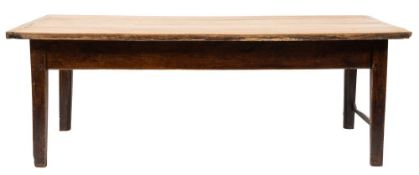 An early 19th Century oak and ash farmhouse kitchen table,: with an overhanging plank top,