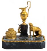 A Regency period inkstand by Thomas Weeks: the gilt bronze dog chained to a tree stump surmounted