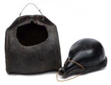 An 18th Century leather costrel and a similar flask: both of typical form, costrel 23 cm wide,