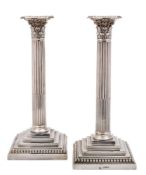 A pair of Victorian silver Corinthian column candlesticks, maker William Hutton & Sons Ltd, London,