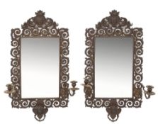 A pair of 19th Century bronze girandole wall mirrors:,