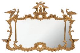 A 19th Century carved giltwood landscape overmantel mirror of cartouche-shaped outline in the