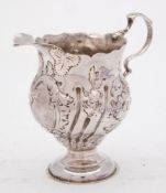 A George III silver pedestal cream jug, maker's mark illegible, London,
