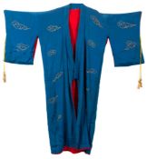 A Japanese silk embroidered kimono: worked in coloured silks with dragon and cloud decoration,