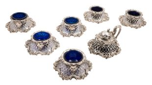 An early Victorian matching silver seven-piece condiment set, maker Charles Thomas Fox & George Fox,