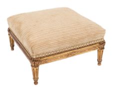 A 19th Century French carved giltwood square footstool:, with an upholstered top,