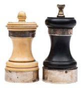 A George V silver mounted ivory capstan pepper mill and a silver mounted ebony pepper mill: the