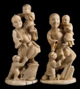 A pair of Japanese carved ivory figures: of a man with son and monkey,