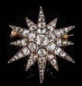 A 19th century silver and diamond-set twelve-point star burst brooch: with graduated round,