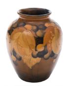 A Moorcroft vase: of ovoid form with flared rim,