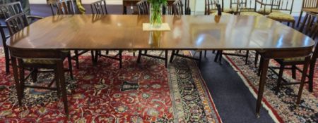 A George III mahogany D-end dining table:,