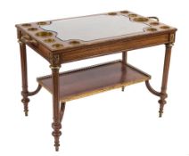 A French mahogany and gilt metal and brass mounted games table:,